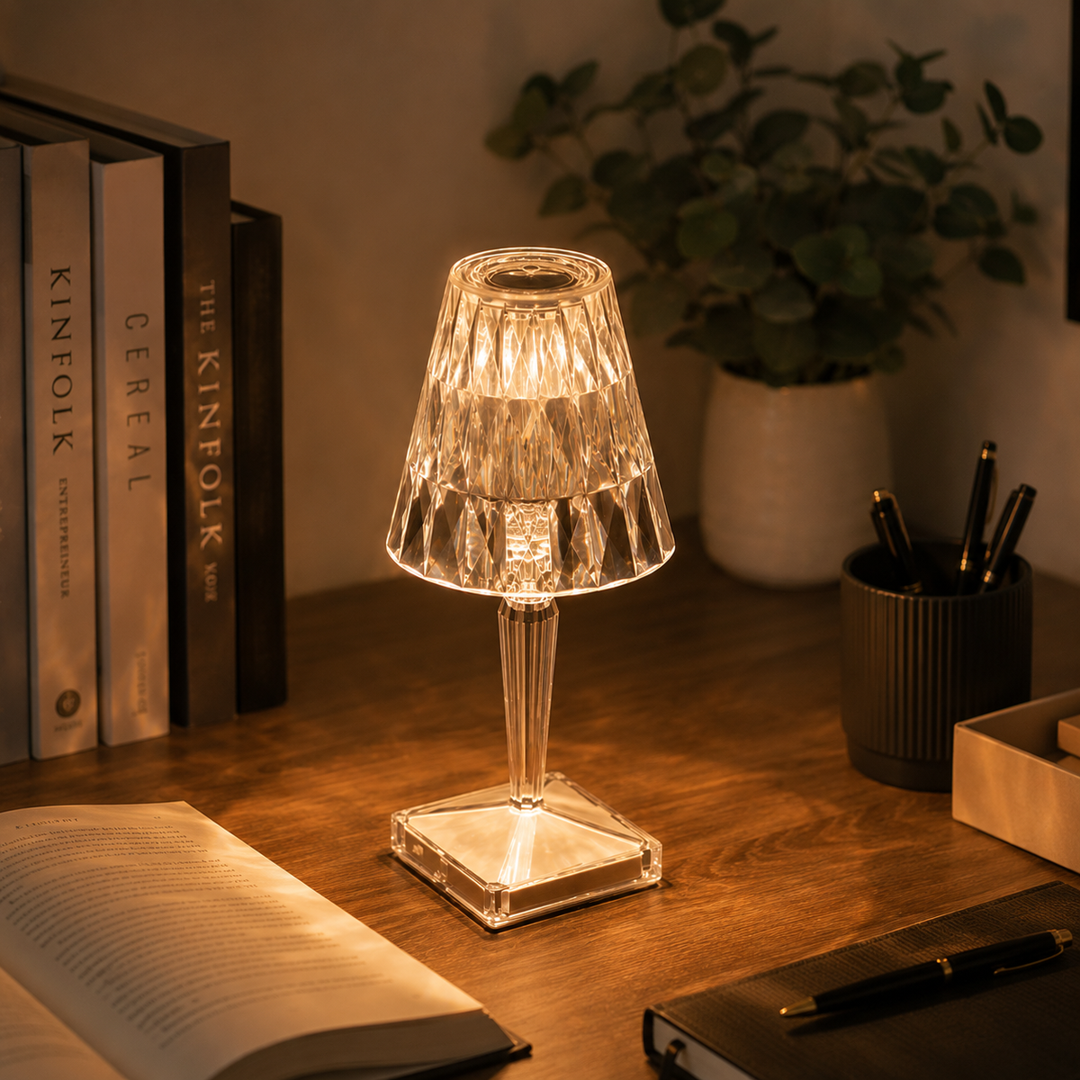 Acrylic crystal touch lamp glowing on study desk with books — Variety Home UK