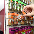 Vinsani 2 Tier Spice Rack Organiser fitted in cupboard, in use